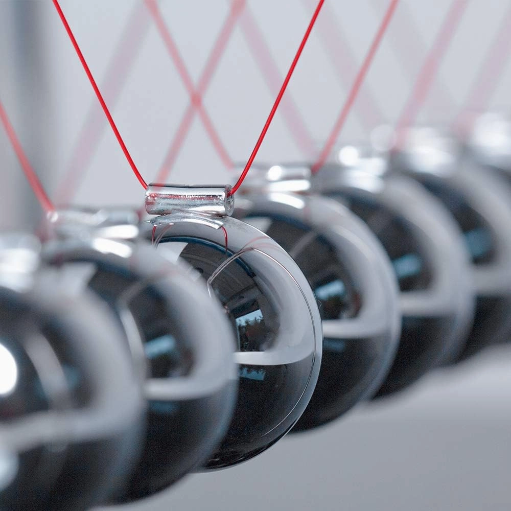 CERROPI Newton Cradle Balance Balls, Newton Pendulum with 7 Balls, Classic Newton Swing Ball, Science Physics Gadget | Desk Toys & Accessories, 70  Sec Swingtime, Marble Base, Black