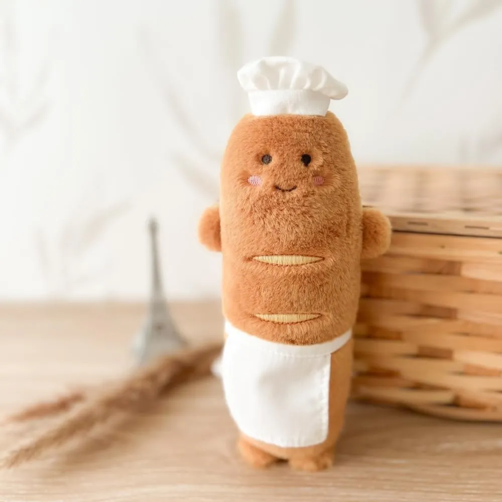 MON AMI Baguette The Chef Plush Toy – 9” Soft Bread Stuffed Doll with Hat and Apron, Adorable Cuddle Toy for Toddlers and Kids